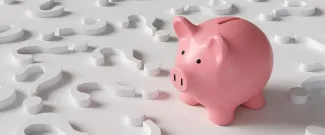 Piggy bank surrounded by question marks representing families trying to understand the new Trump Accounts savings program for children.