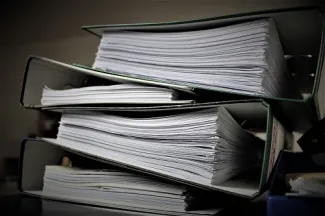 Organized financial documents and important records neatly stored in a binder for easy access.