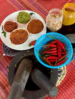 Cooking class in Thailand representing flexible retirement, travel, and lifestyle-focused financial planning