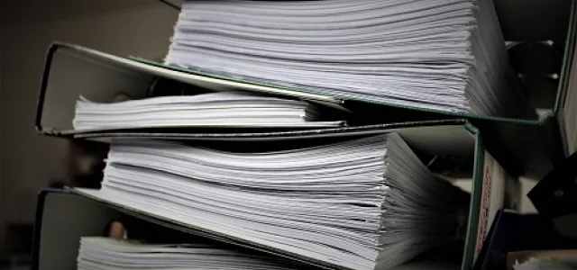 Organized financial documents and important records neatly stored in a binder for easy access.